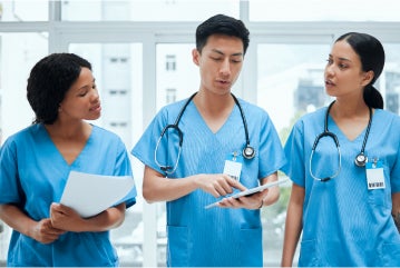 Three nurses talking